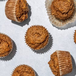 banana bran muffins on blue background